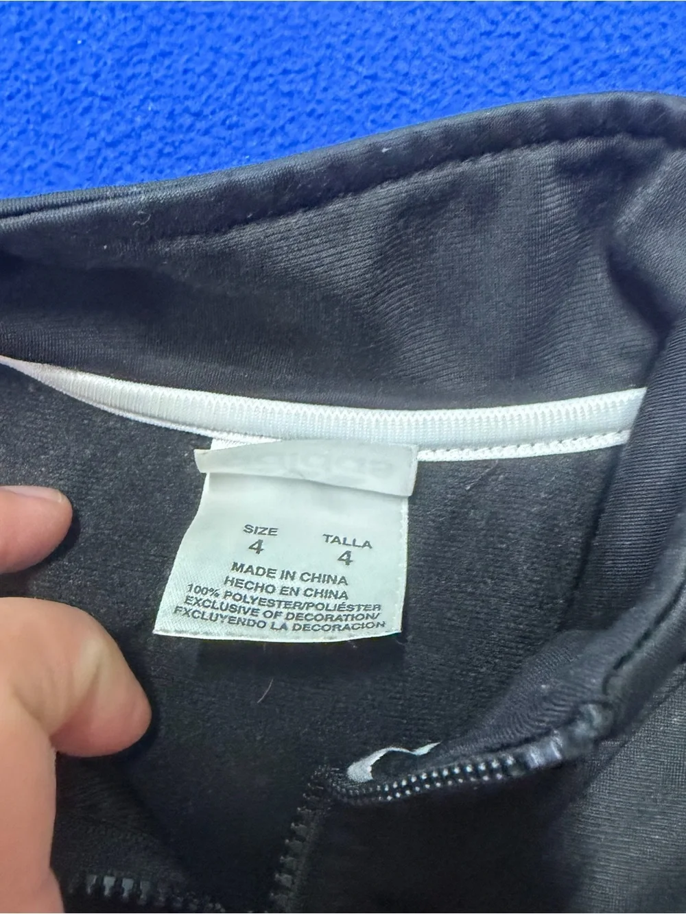 Adidas Black Jacket with White Sleeve Stripes kids 4 has flaws